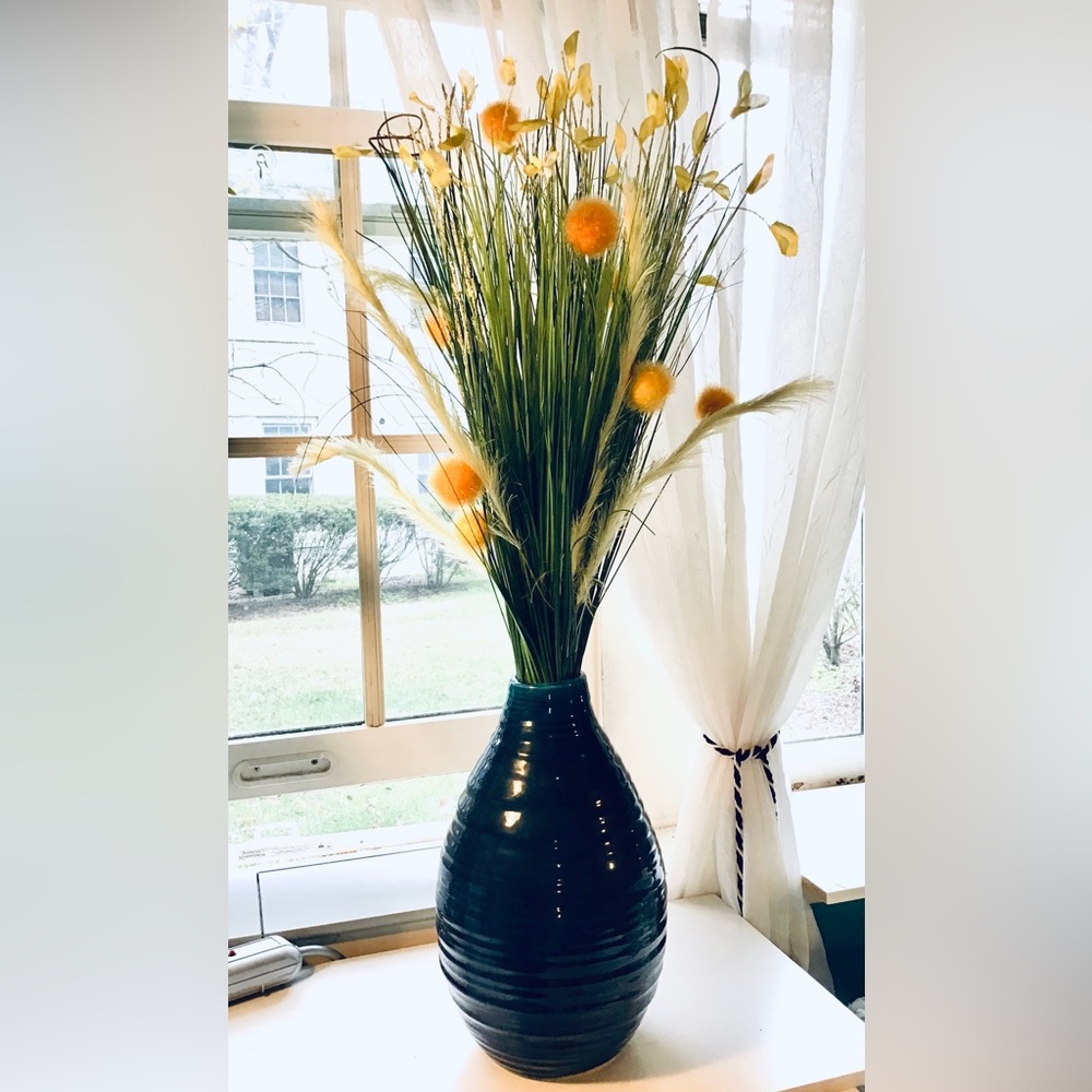 Only Craigslist VA. Cute vase with floral arrangement.